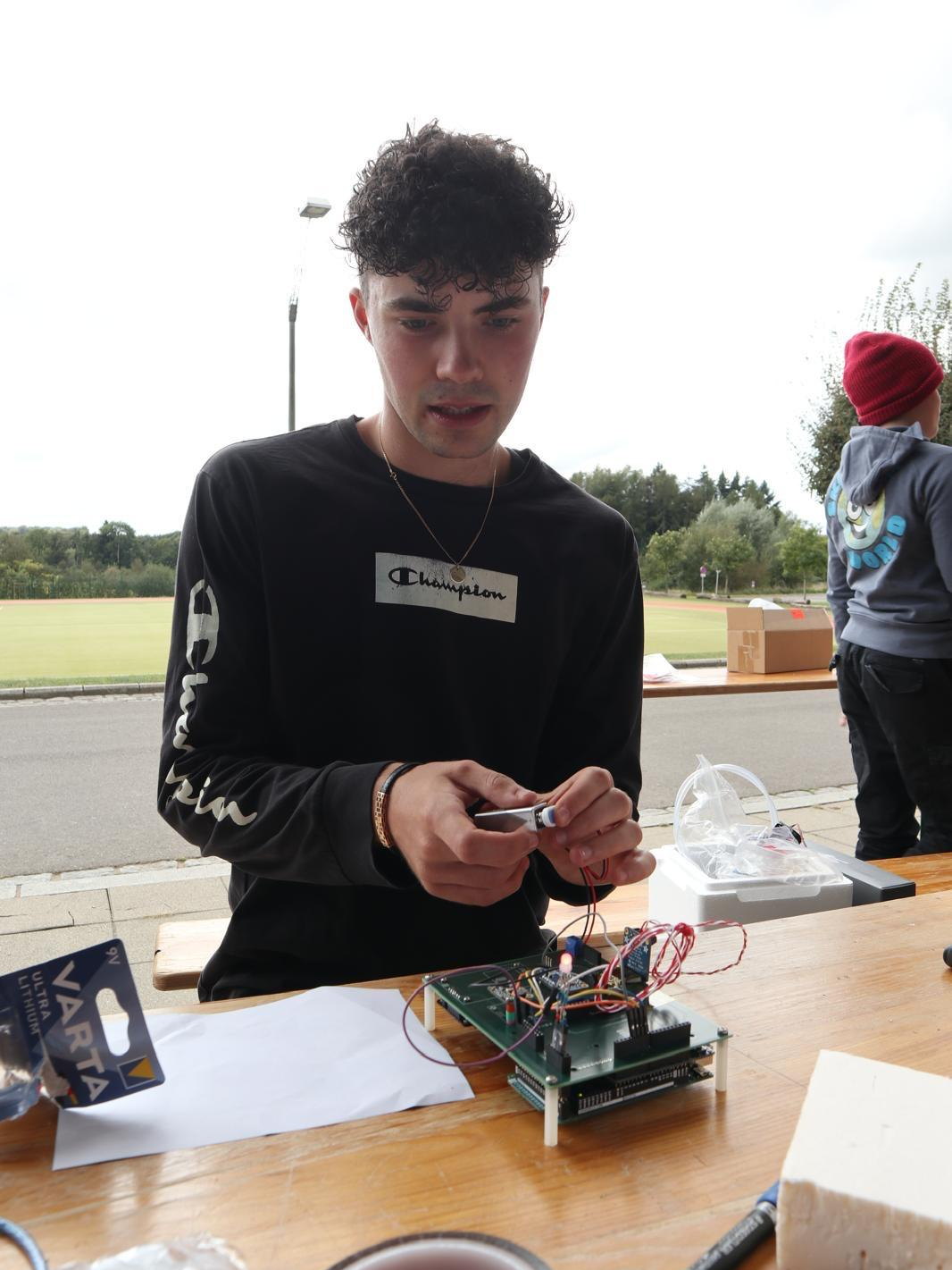 Assembling the data acquisition board before launch